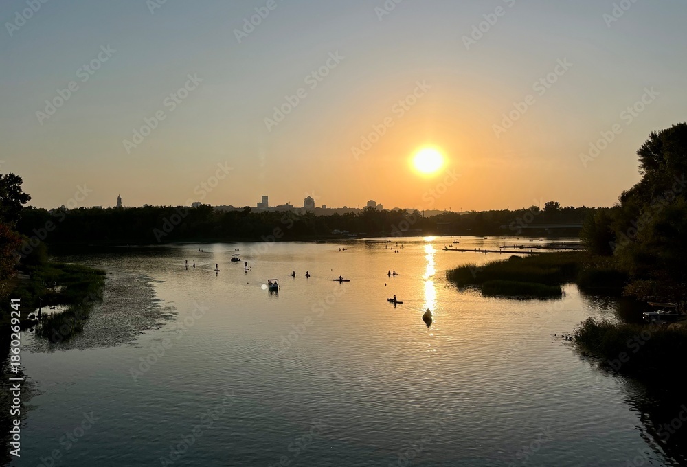 Naklejka premium sunset over the river