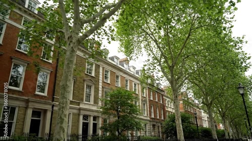 Wallpaper Mural Row of brick buildings with trees and sky Torontodigital.ca
