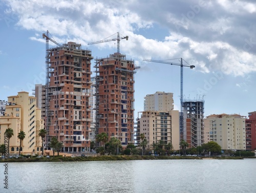 waterfront towers under construction, coastal development