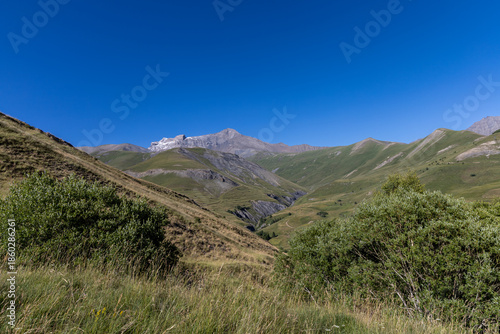 View of La Meije from the Emparis Plateau in the Arves Massif, Hautes-Alpes, France