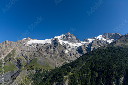 View of La Meije from the Emparis Plateau in the Arves Massif, Hautes-Alpes, France