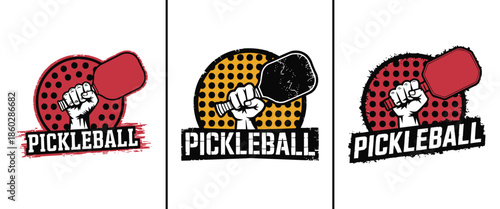 Collection of three distressed graphic logos featuring a clenched fist holding a pickleball paddle above bold text designs