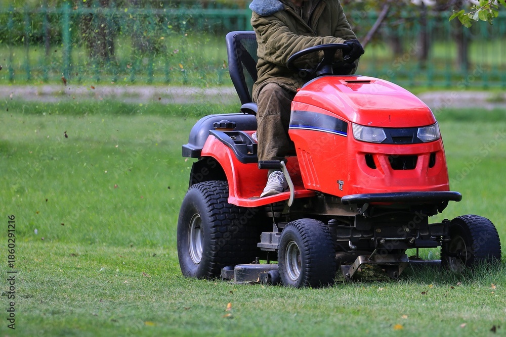 Obraz premium lawn mower in the park