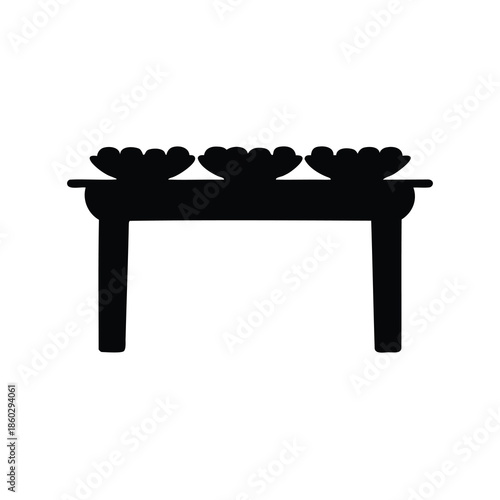Three bowls of fruit on a table in a black silhouette