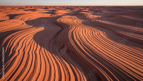Smooth sandstone ripples in terracotta and peach tones
