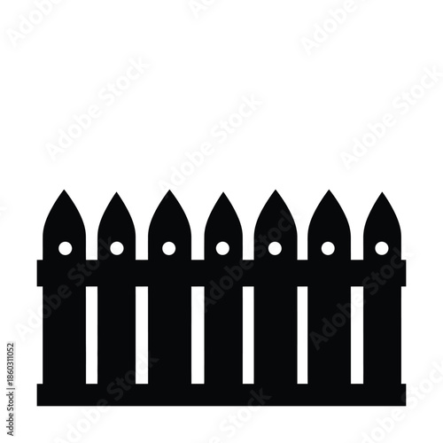 Modern black picket fence with pointed tops