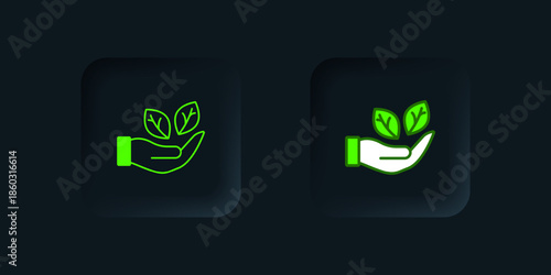 Green Hand hold a leaf of the plant icon isolated on black background. Care nature. Leaf shoots with environmental protection. Black square button. Vector