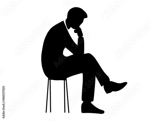 silhouette of a business man sitting while thinking
