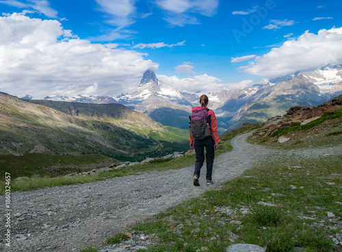 Female hiker with the Matterhorn in the background