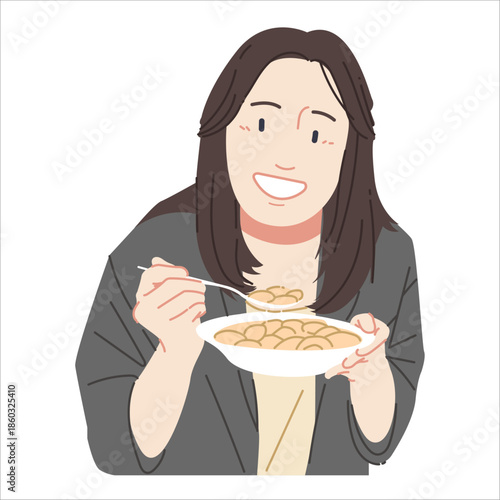A woman in a gray cardigan is excited about the food she is enjoying because it looks delicious