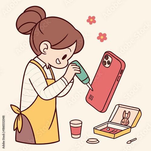 Woman decorating a phone case with creative flair