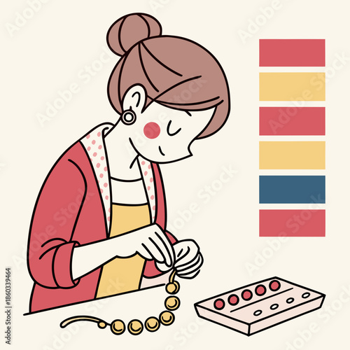 Woman making jewelry with beads and tools