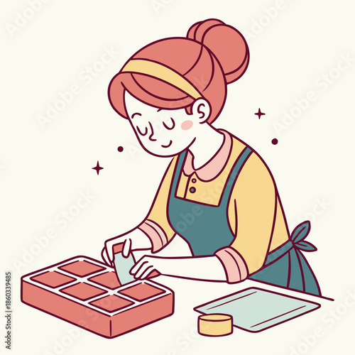 Woman making soap in a mold at home