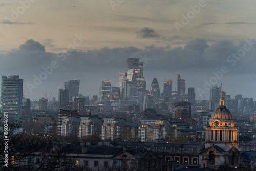 London cityscape at dusk with cloudy sky