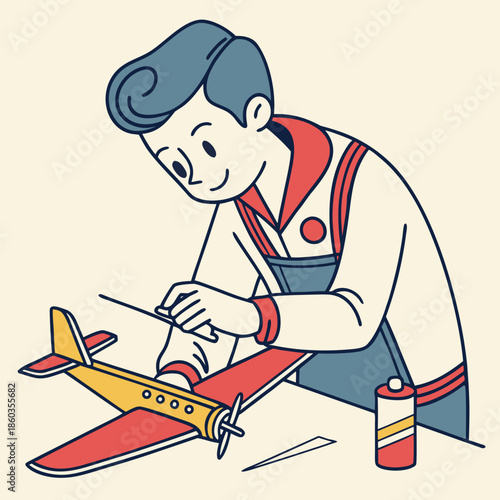 Boy building a model airplane