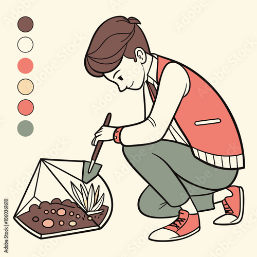 Boy planting a terrarium with a shovel
