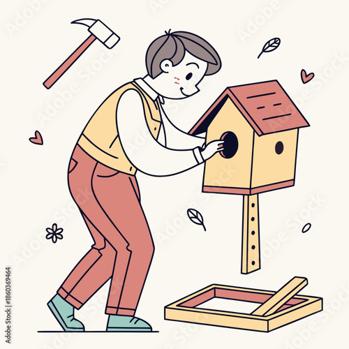 Man building a birdhouse with a hammer