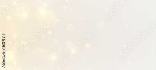 Golden glittering background. Shiny dust, bokeh effect. Magic falling golden lights and stars.