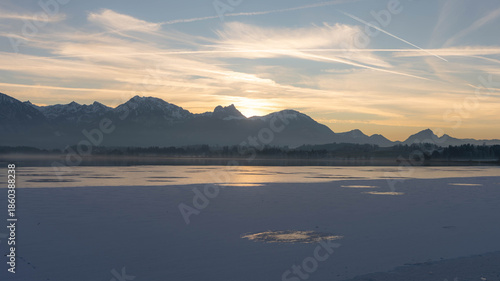 Wallpaper Mural Sunset on Lake Hopfen in Bavaria Germany in Winter 2025 - Beautiful Alps with Great LIght and Ice. High quality photo Torontodigital.ca
