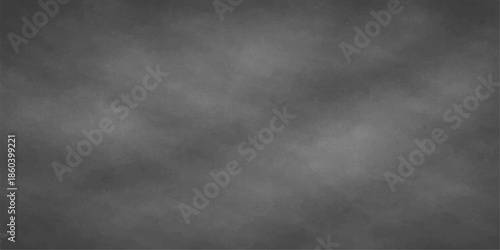 A dark and black grunge background features a textured stone wall pattern with a grey aged surface and rough vintage concrete paint for a blank dirty wallpaper backdrop. black and white smoky fog