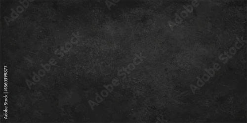 A dark and black grunge background features a textured stone wall pattern with a grey aged surface and rough vintage concrete paint for a blank dirty wallpaper backdrop. black and white smoky fog