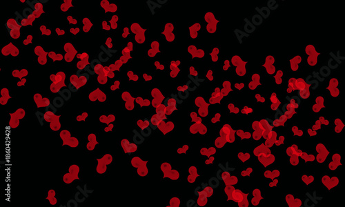 Vibrant red hearts scattered randomly against a dark background creating a romantic and festive atmosphere perfect for valentine's day or anniversary celebrations.