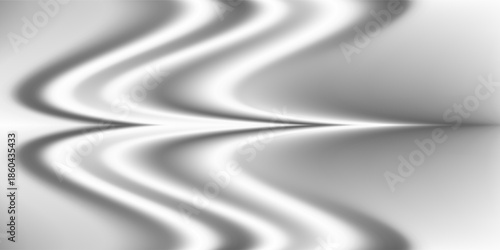 Silver foil background with a metallic mirror texture. Chrome gradient surface with a slight sheen. Gray aluminum sheet with reflections.