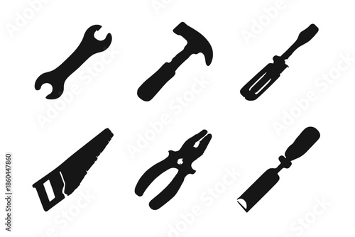 Solid Tool Icons. Solid vector icons of hand tools: wrench, hammer, screwdriver, saw, pliers, chisel No text, No labels, isolated