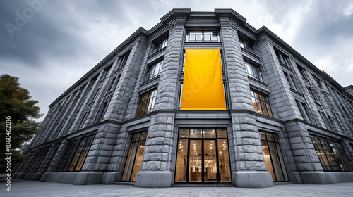 yellow advertising banner in the center of a simple facade of a modern building or shopping center, minimalist architectural style of the Northern Renaissance with a bright accent of color