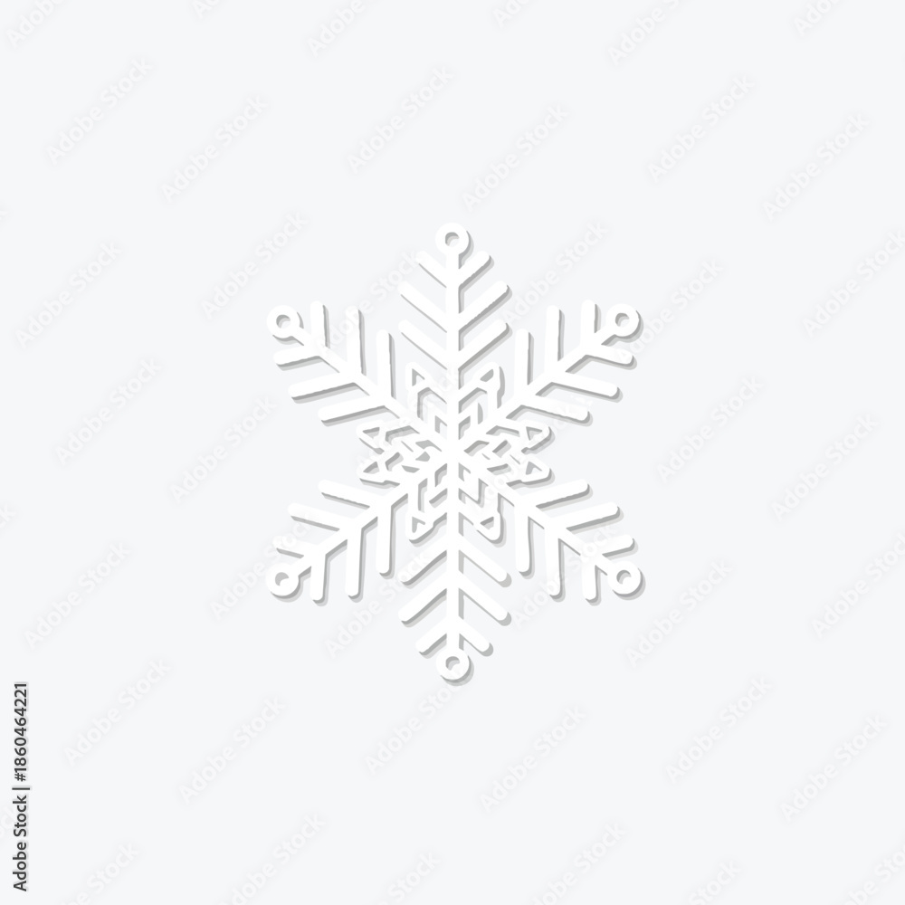 Fototapeta premium A white paper snowflake with shadow effect against a plain white background