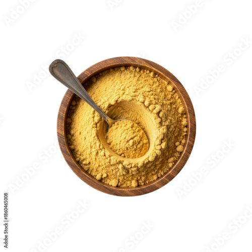 Mustard powder in wooden bowl with spoon