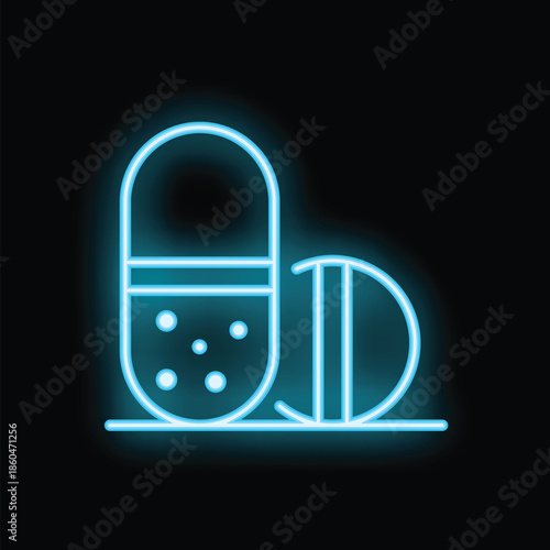 Blue neon sign representing a capsule and a round pill standing on a surface, on black background