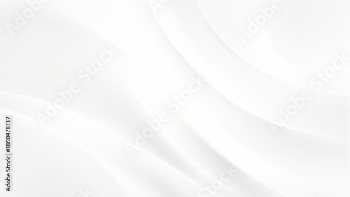 A softly draped flowing white fabric creates gentle curves and highlights presenting a clean and minimalist aesthetic