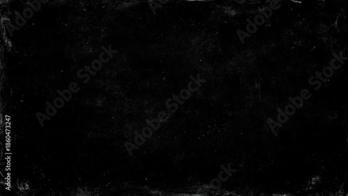 A completely black textured image with a grainy appearance and subtle variations in darkness displayed