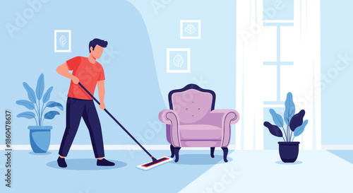 Young man using a mop to clean the floor of a tidy living room with an armchair, green plants, and light from a window.