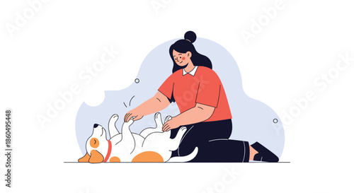 Happy woman kneeling on the ground while playfully rubbing the belly of her pet dog against a soft blue background.