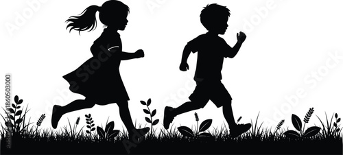 Black silhouette of a young boy and girl running playfully in a meadow with tall grass and wildflowers for childhood and active lifestyle concepts