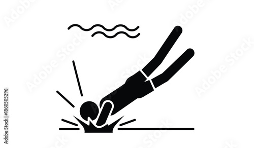 A silhouette of a person diving headfirst into the water