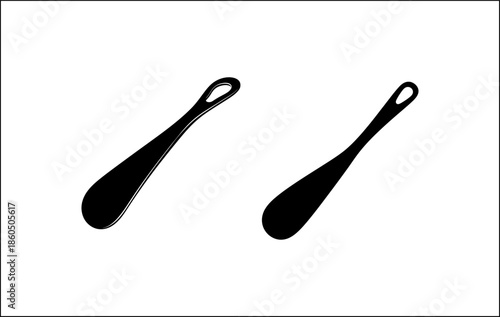 Modern black spoons on white background