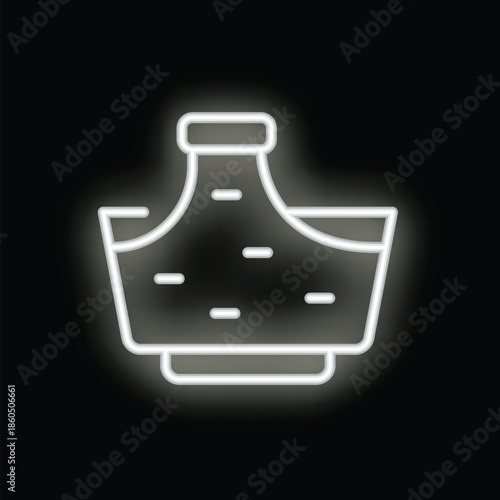 White neon sign of a baby bib glowing on a black background