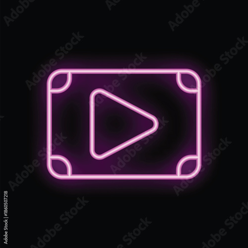 Bright pink neon sign is glowing in the dark showing a play symbol in a frame