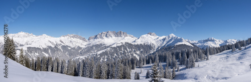 Praettigau, Switzerland - February 15th 2025: Amazing panorama of an alpine winter landscape
