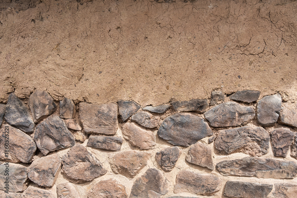 Fototapeta premium Close-up view of a traditional Peruvian wall at the Pisac archaeological site, in the Sacred Valley of Peru