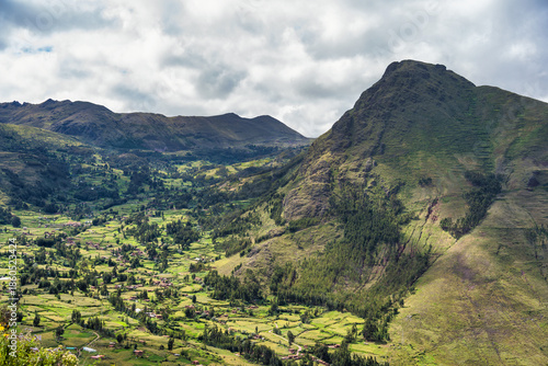 Scenic view overlooking the lush green landscape of the Sacred Valley of the Incas. View from Pisac Archaeological Site