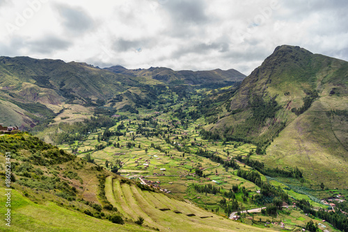 Scenic view overlooking the lush green landscape of the Sacred Valley of the Incas. View from Pisac Archaeological Site