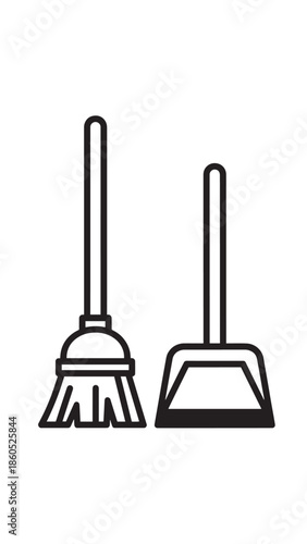 Broom and dustpan cleaning tools set ready for tidying up and sweeping.