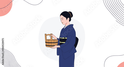 Elegant Japanese woman in a traditional blue kimono holding a wooden bucket for a tea ceremony or onsen hot spring visit.
