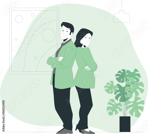 A man and woman standing together in a modern office space with a plant nearby