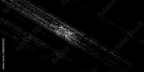 Abstract texture grunge made of diagonal streaks and distressed lines, black ink on a white background. grunge scratch patterns, chaotic linear noise. dirty monochrome pattern of the old worn surface.