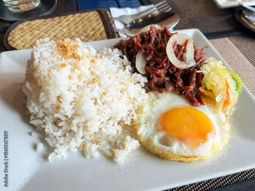 Classic Filipino Breakfast Corned Beef, Garlic Rice, and Fried Egg Cornsilog